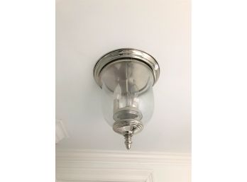 A Ceiling Mounted Chrome Bell Canister Ceiling Light