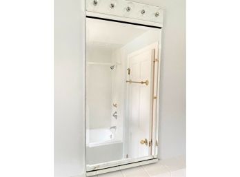 A Robern Mirrored Medicine Cabinet With Vanity Lights