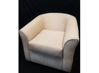 Cream Colored Swivel Barrel Chair