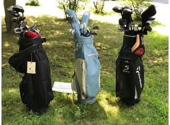 Three Sets Of Golf Clubs