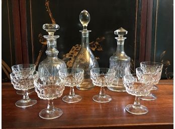 Three Glass Decanters And Crystal Glasses