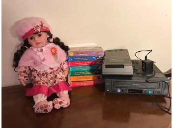 Doll And VHS Player And VHS Collection
