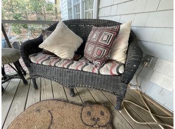 Outdoor Wicker Loveseat And Pillows
