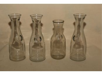 Four Vintage Clear Glass Carafs