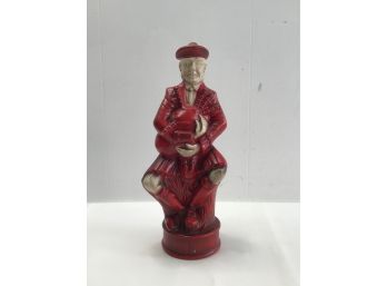 Red Dressed Man Figure