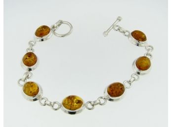 Sterling Silver 7' Oval Brown Stone Link Bracelet With Toggle Closure