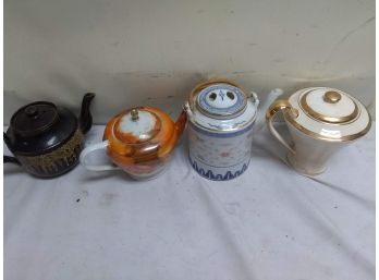 Group Of Four Tea Pots
