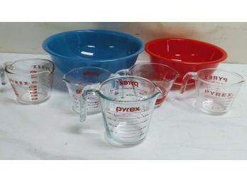 Group Of Pyrex Measuring Cups And Mixing Bowls