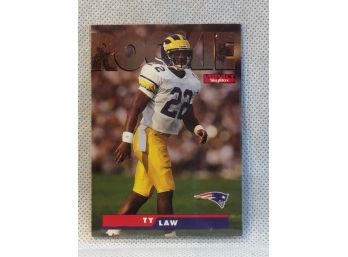 1995 Skybox Impact Ty Law Rookie Card