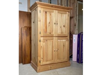 A Paneled Pine Armoire