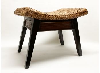 A Woven Seated Stool On Wood Base