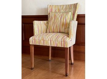 An Upholstered Armchair By Greenbaum Interiors
