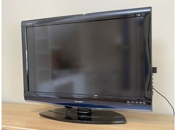 A Sharp Aquos 32' Flat Screen TV
