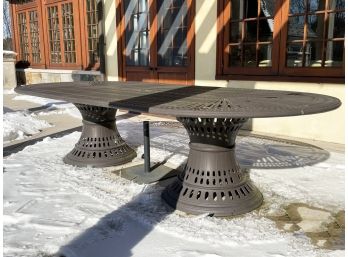 A Cast Aluminum Outdoor Umbrella Table By Tropitone