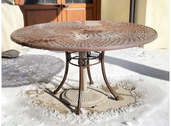 A Cast Aluminum Outdoor Umbrella Table By Woodard