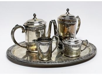 An Antique Silver Tea And Coffee Service