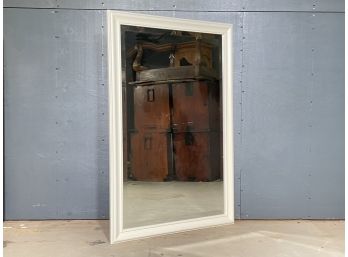 A Painted Wood Framed Mirror