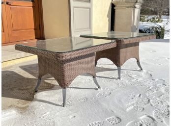 A Pair Of Woven Resin Glass Top Outdoor Side Tables By Cast Classics