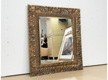 A Beveled Mirror In Gilt Wood Frame