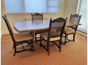 Trestle Dining Table With Four Cane Back Chairs