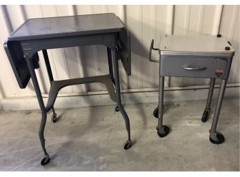Two Metal Industrial Style Stands On Wheels