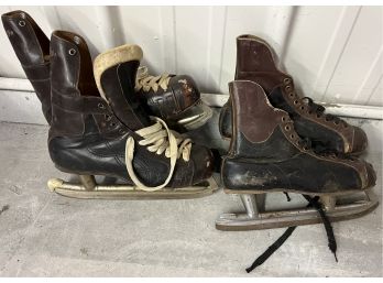 Two Pairs Of Hockey Skates