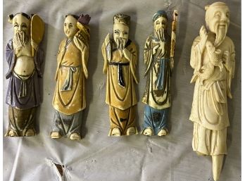 Five Carved Bone And Paint Decorated Figures