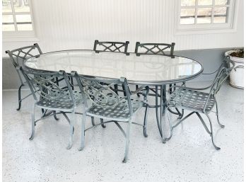 A Vintage Outdoor Cast Aluminum Dining Table And Chairs By Woodard