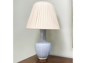 A Glazed Ceramic Lamp On Brass Base