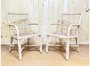 A Pair Of Vintage Rattan Arm Chairs, Possibly Ficks Reed