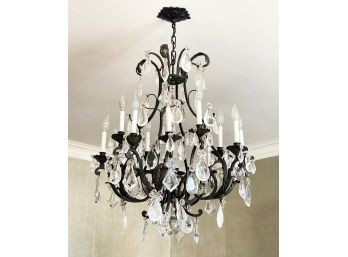 A Stunning Wrought Iron And Rock Crystal Chandelier