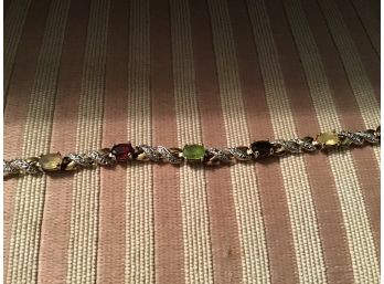 Sterling Silver Bracelet With Garnet, Peridot And Various Other Stones