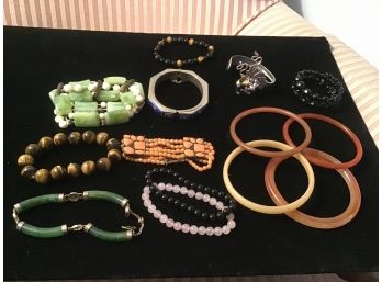 Vintage Lot Of Thirteen Bangles And Bracelets Including Jade, Tigers Eye, And Other Semi-Precious Stones