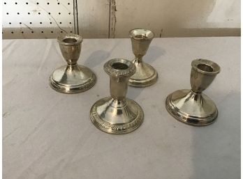 Lot Of Four Sterling Silver Candle Holders
