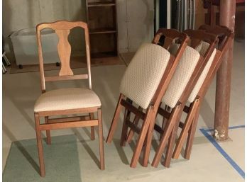 Four Upholstered Stakemore Co. Folding Chairs