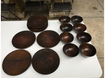 Eight Wooden Plates And Bowls