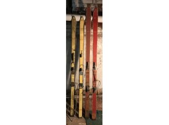 Two Pairs Of Old Skis