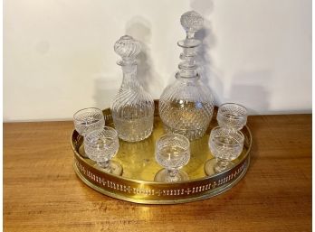 Two Stoppered Blown Glass Decanters And Five Cordial Glasses On A Brass Tray