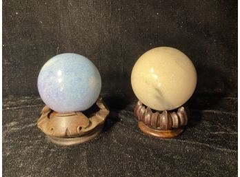 Two Beautiful Polished Rock Balls On Rosewood Risers
