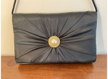 Andre Celini Pearl Front Bag