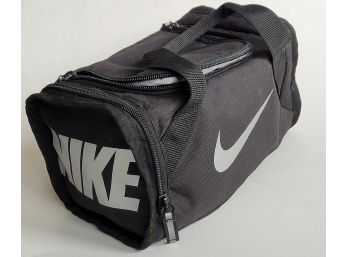 A Small Nike Black Bag With Logo