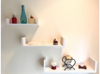 Three Shelves With Perfume And Knick Knacks