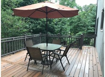 Four Outdoor Chairs And Table With Eight Foot Umbrella