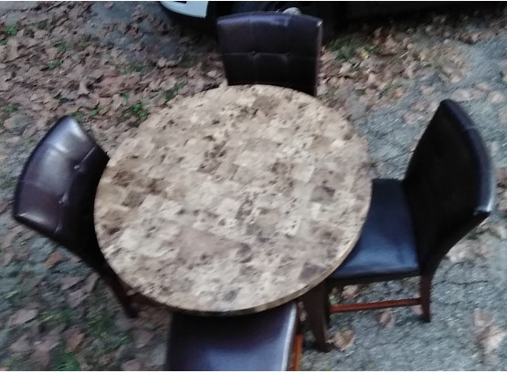 Stone Table And 4 Brown Leather Chairs