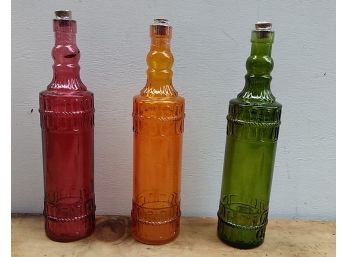 3 Colorful Glass Bottles With Corks
