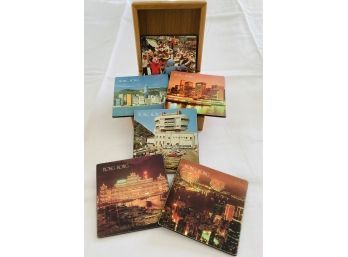 A Box Of Coasters With Building And Events From Hong Kong