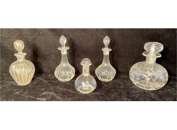 Five Small Stoppered Glass Bottles