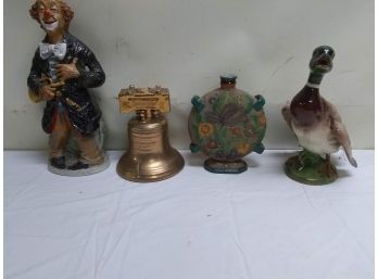 Three Decanters And Duck Figure
