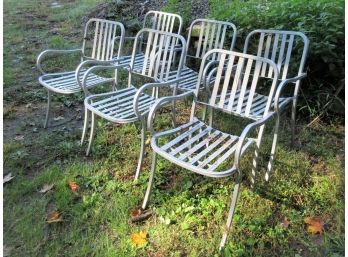 Six Stacking Metal Chairs