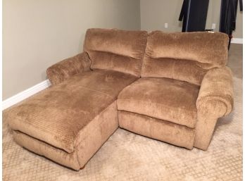 Two Piece Sectional Seating Each With Motorized Recline Feature